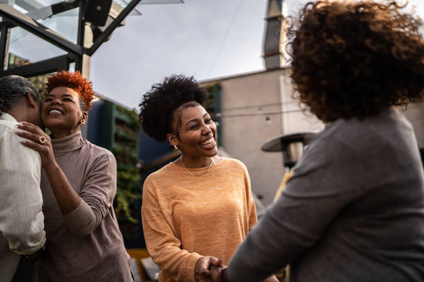 Woman greeting friends